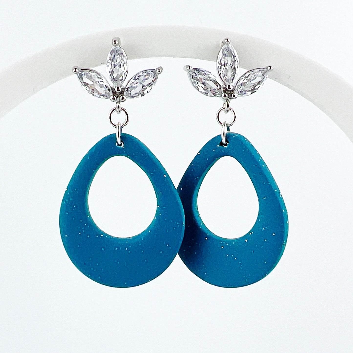 Earrings Kisa - Shimmering Turquoise Teardrop with Floral Cubic Zirconia Posts