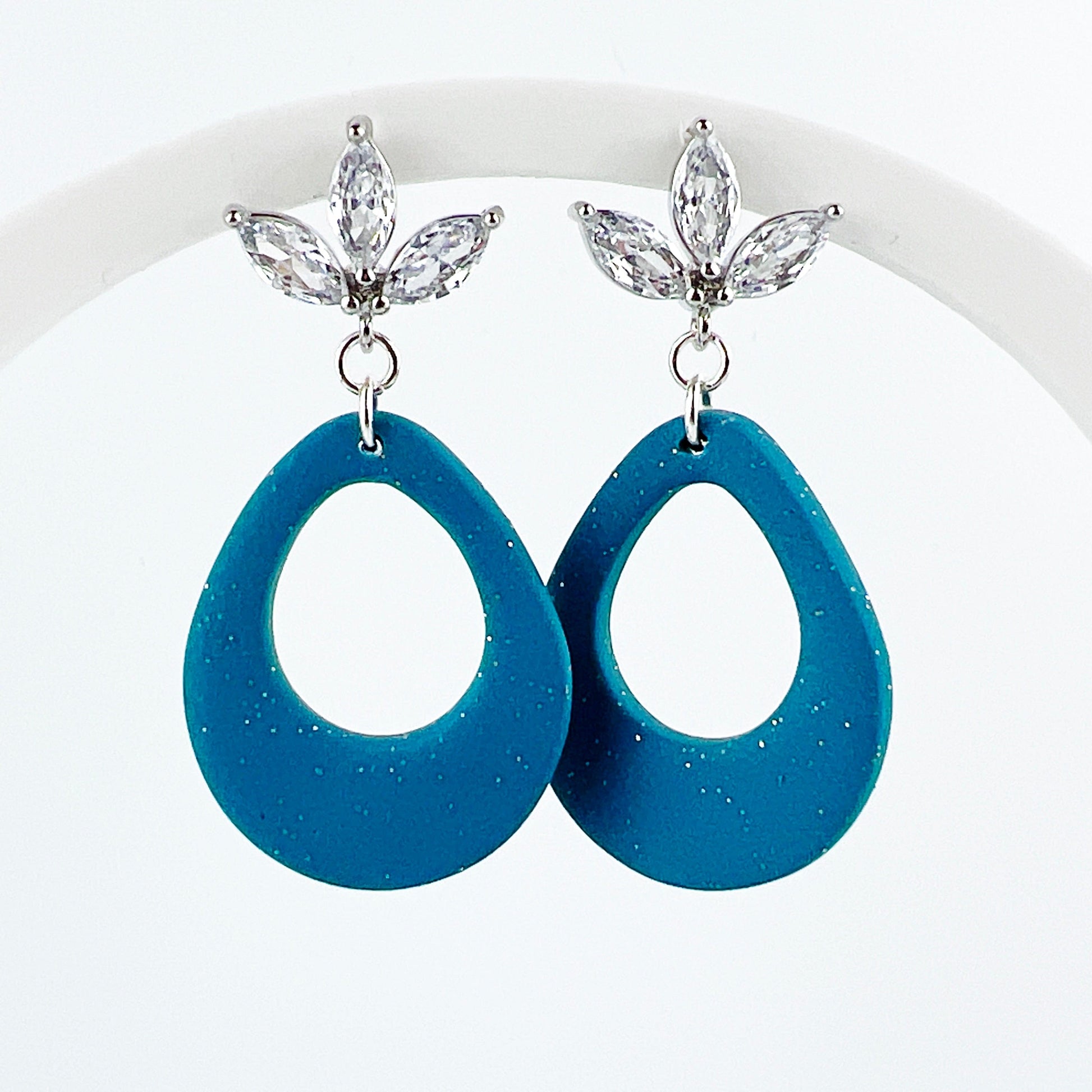 Earrings Kisa - Shimmering Turquoise Teardrop with Floral Cubic Zirconia Posts