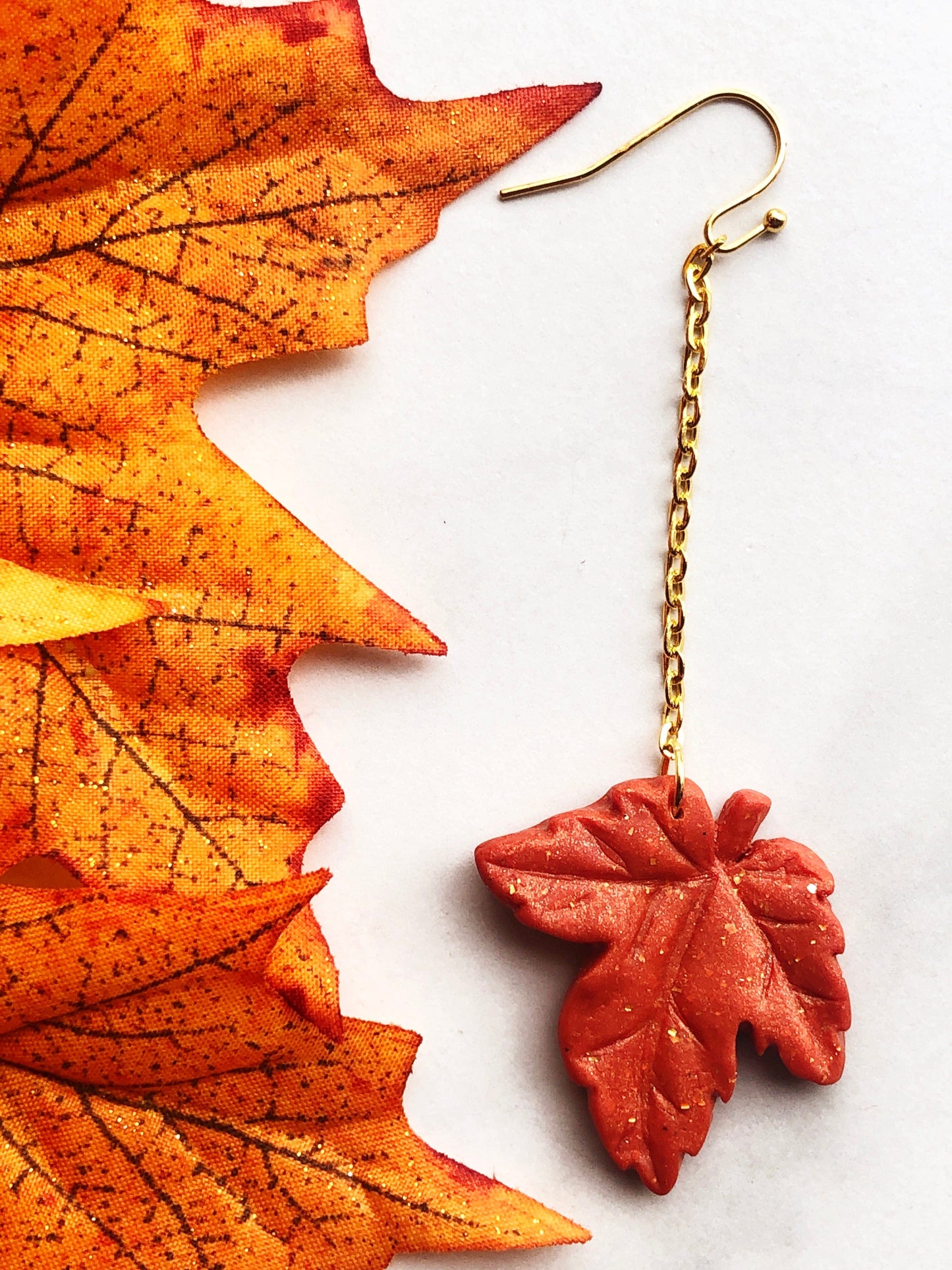 Earring Rhea - Orange Maple Leaf Earrings on Gold Chain