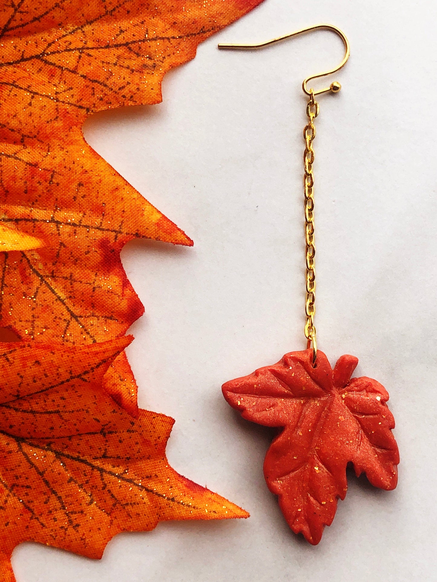 Earring Rhea - Orange Maple Leaf Earrings on Gold Chain