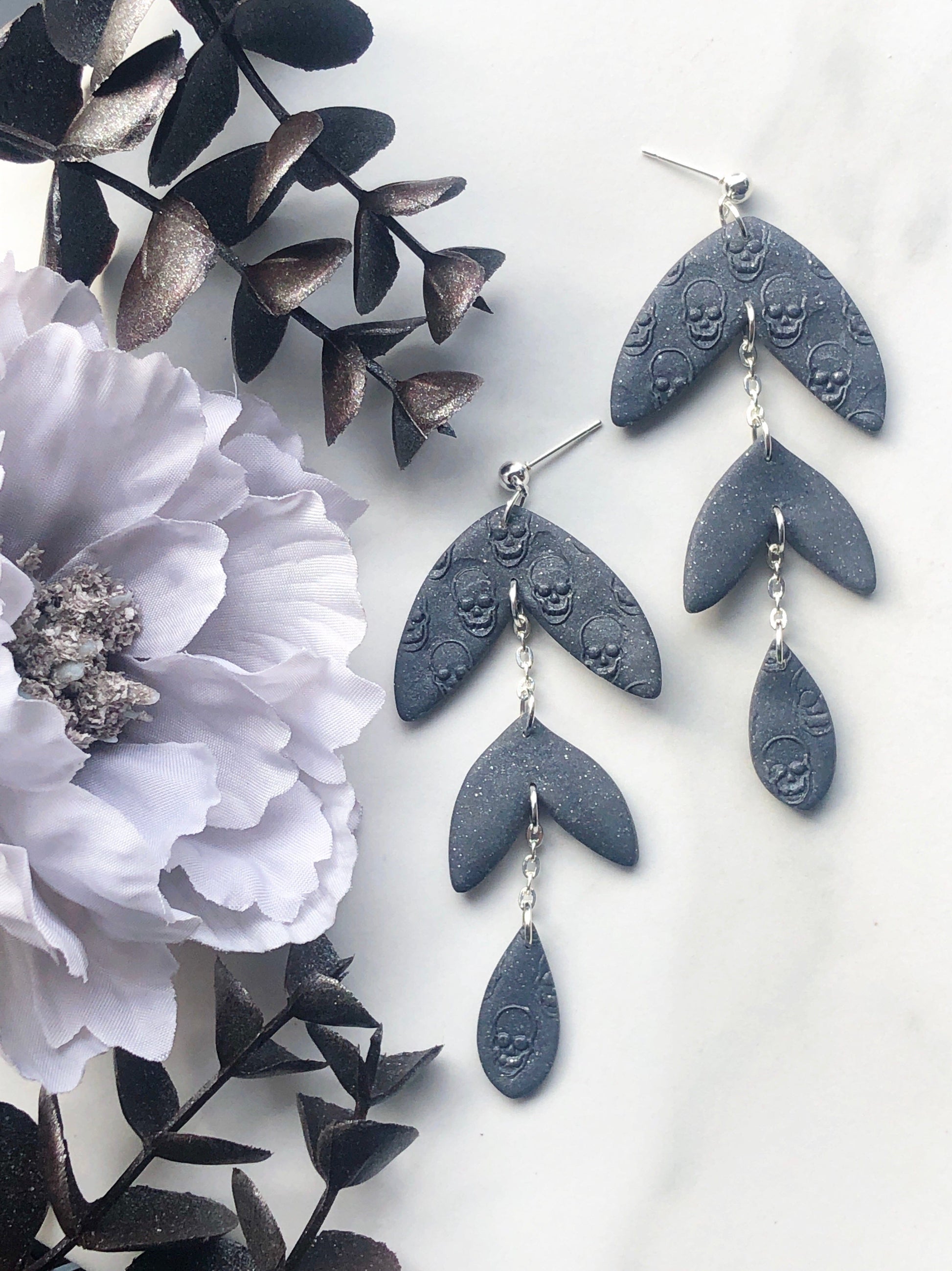Earrings Raine - Grey Leaf Shaped Earrings with Embossed Skulls