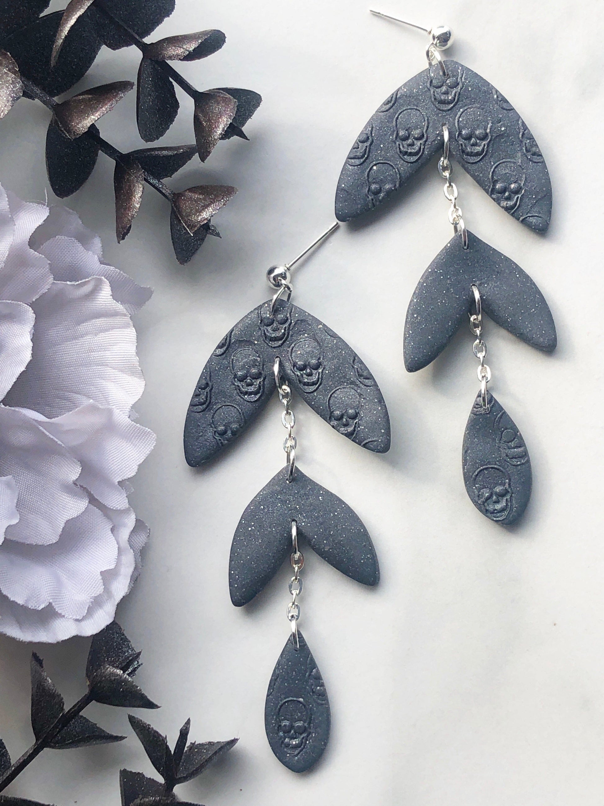 Earrings Raine - Grey Leaf Shaped Earrings with Embossed Skulls