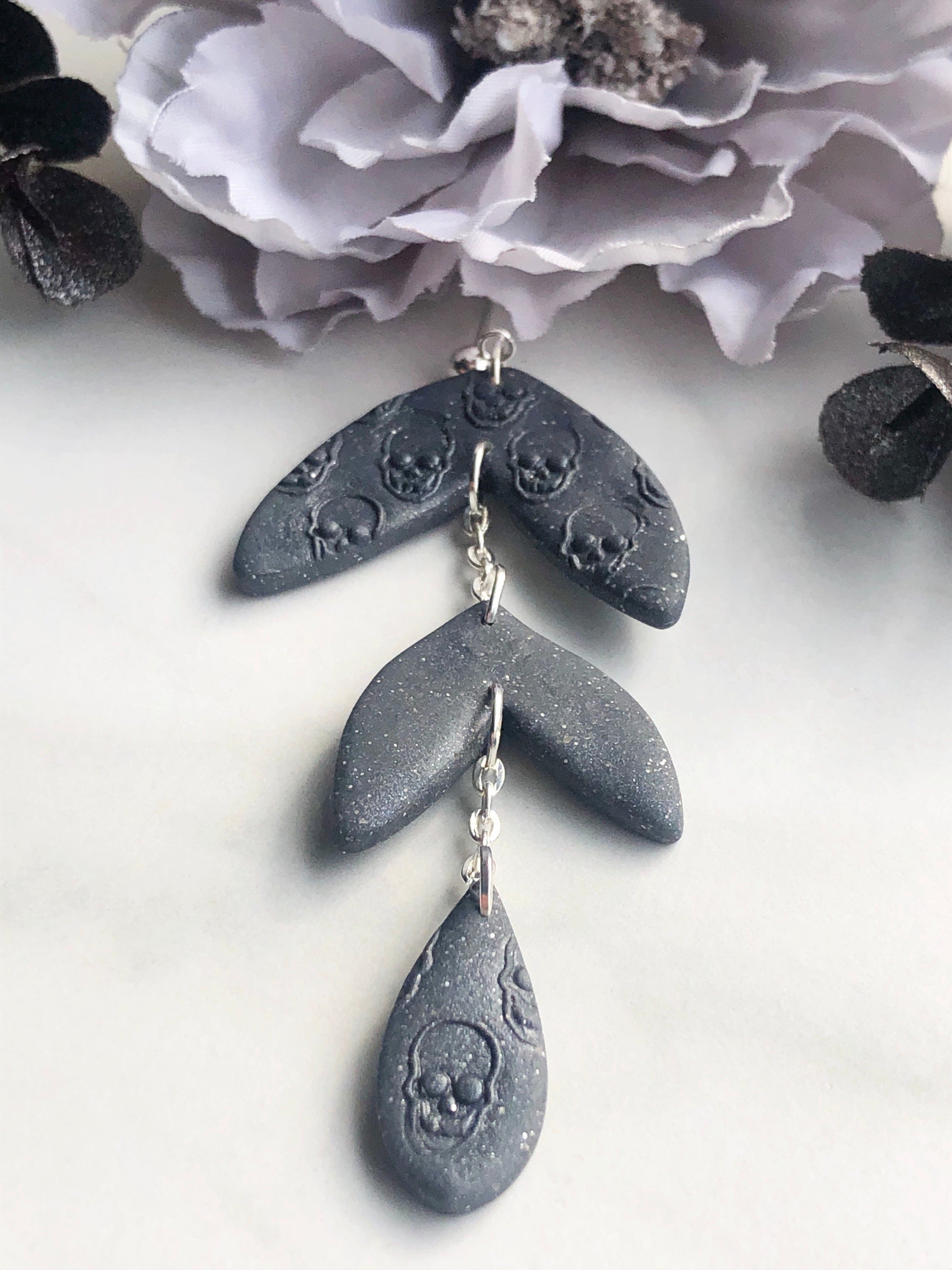 Earrings Raine - Grey Leaf Shaped Earrings with Embossed Skulls