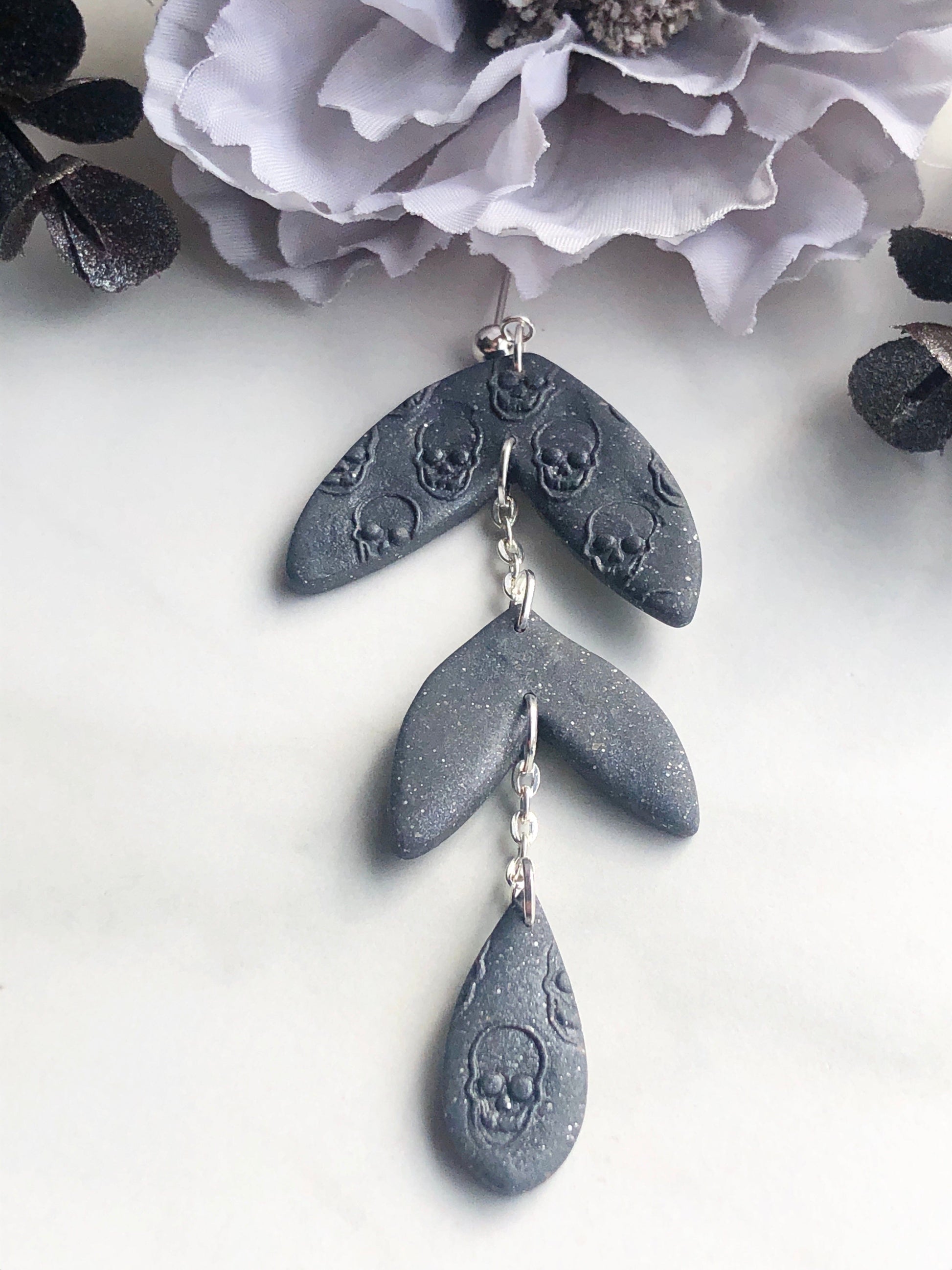 Earrings Raine - Grey Leaf Shaped Earrings with Embossed Skulls