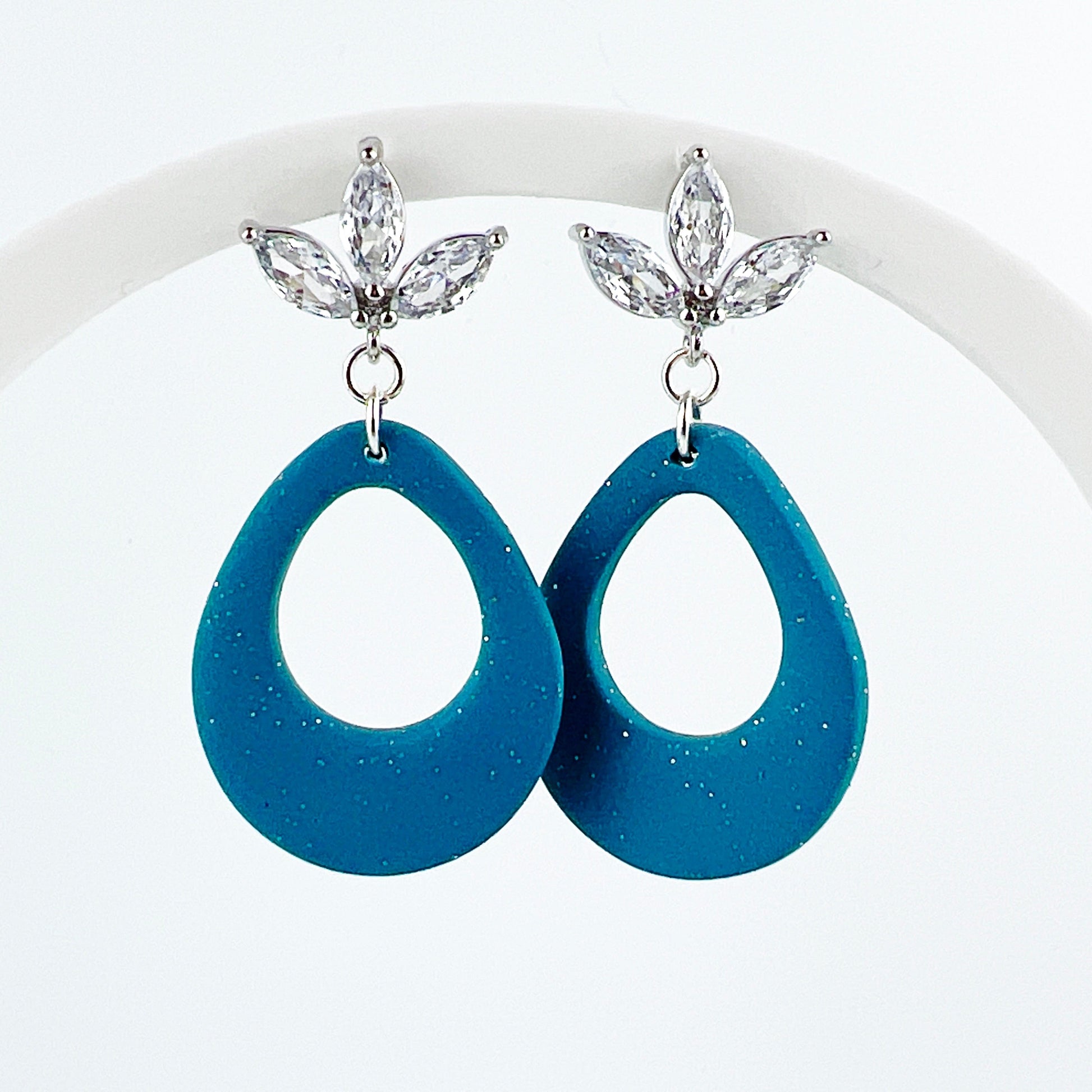 Earrings Kisa - Shimmering Turquoise Teardrop with Floral Cubic Zirconia Posts