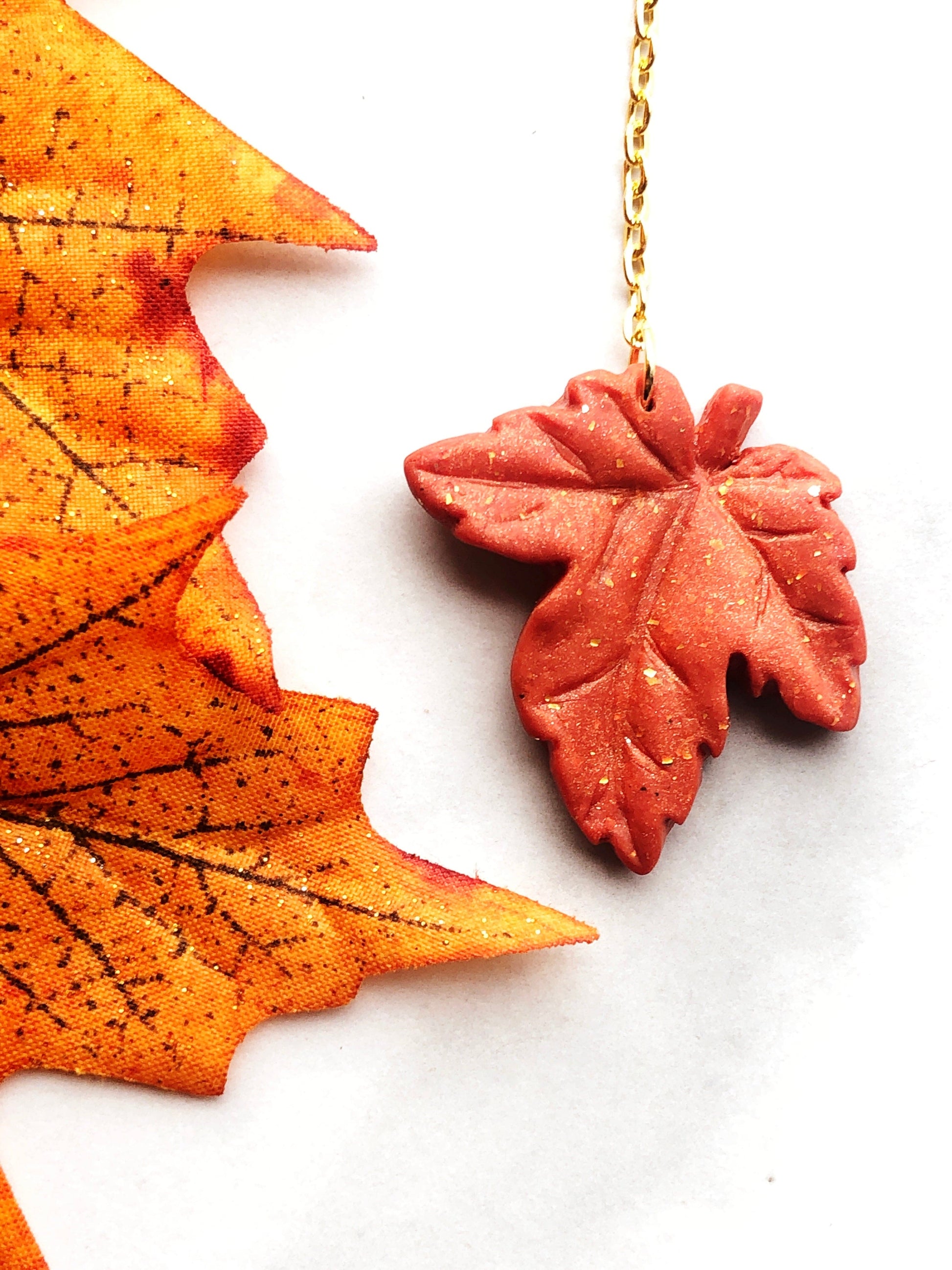 Earring Rhea - Orange Maple Leaf Earrings on Gold Chain